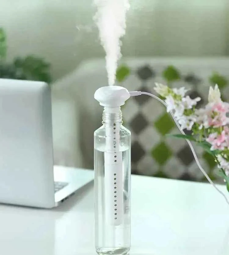 USB Mini Ultrasonic Humidifier™ with LED Lamp and Essential Oil
